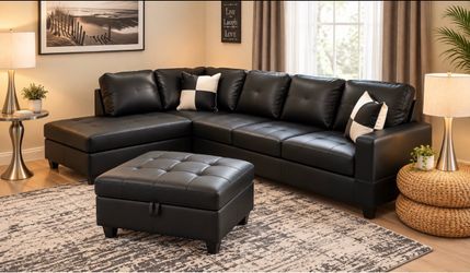 Black leather sectional couch and ottoman