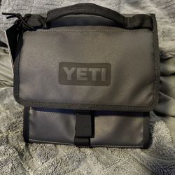 Brand new yeti lunch bag used to keep your items cold