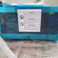 GE 1.6-cu ft 1150-Watt Countertop Microwave (Stainless Steel)