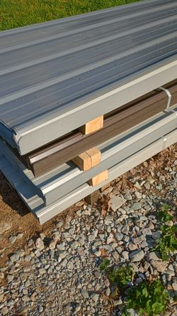Metal sheet ideal for roofs, measuring 3 by 12, brand new