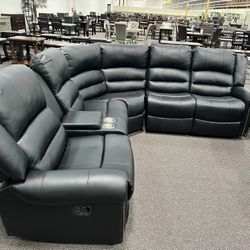 New Reclining Sectional.  Brown Or Black Leather.  111” X 98”.  Free Delivery!