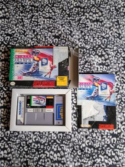 Super Nintendo Winter Olympic games game in box with manual for $20