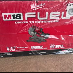 Milwaukee miter saw with charger and battery