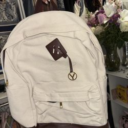 White backpack with leather detail