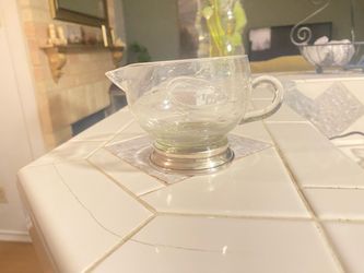 Sterling silver glass cream holder