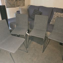 Four Grey Chairs