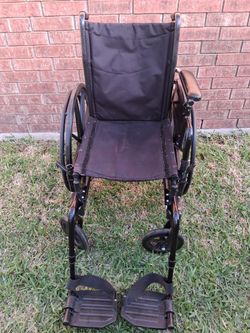 Wheelchair/Silla de Ruedas