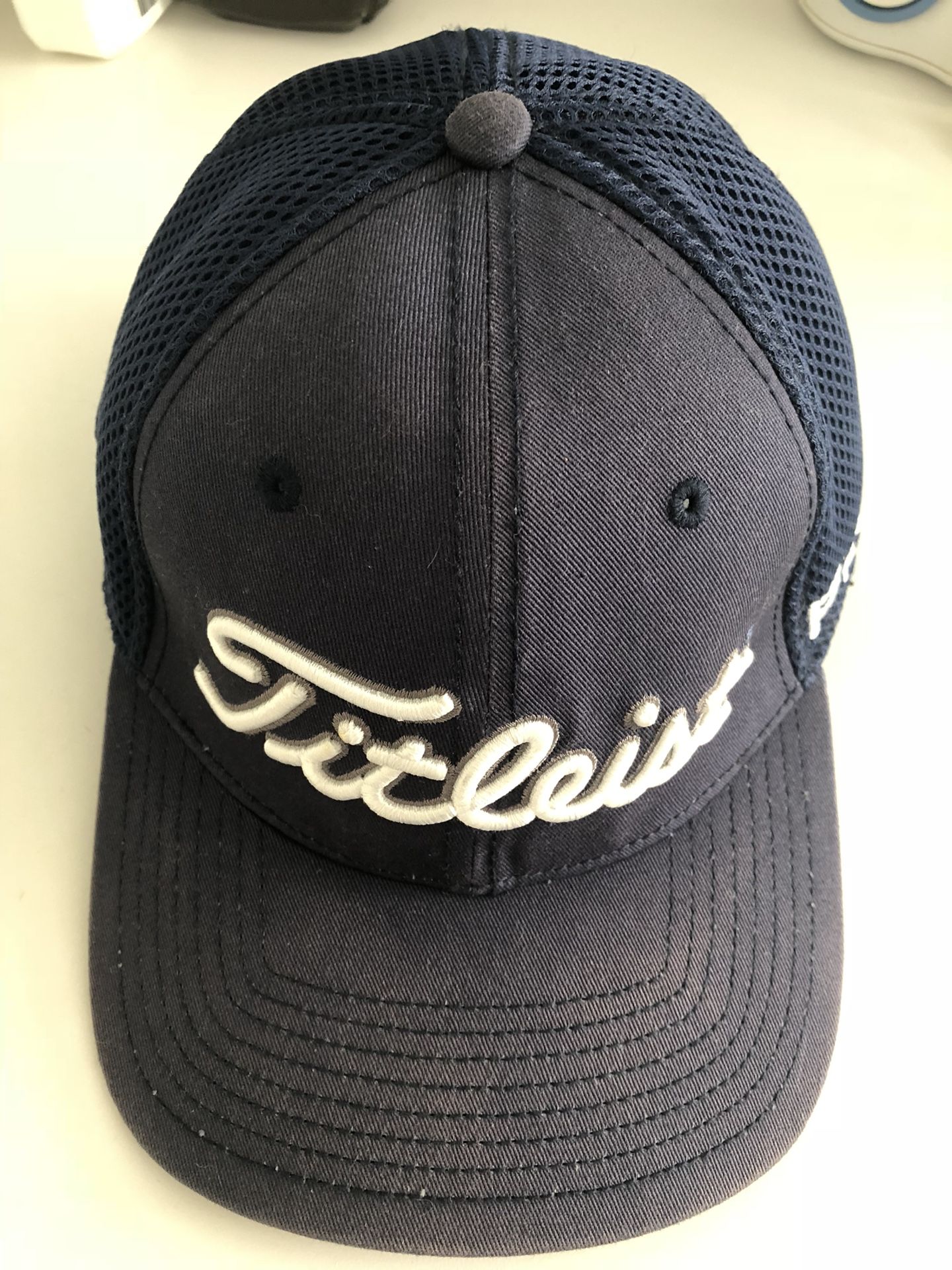 Like new navy blue Titleist Hat size S/M