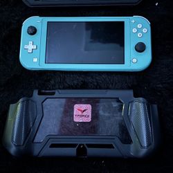 nintendo switch lite (with games)