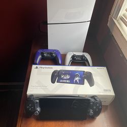 PlayStation 5 with 2 controllers and a PlayStation 5 portal