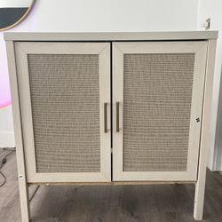 Two-door storage cabinet in cream color 
