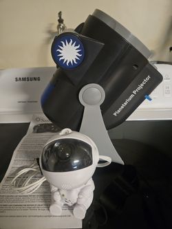 Space Projector And Astronaut Projector. Both $10