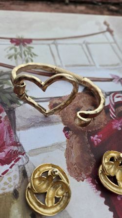 hammered gold-tone open heart hinged bangle. and beautiful earrings