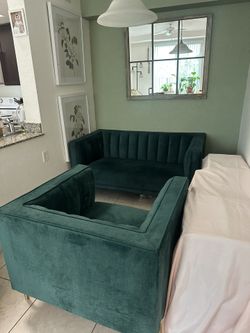 Two green Sofas