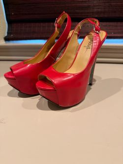 Taylor Says “Glenda” Red Heels