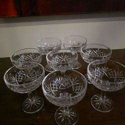 Set of eight cut crystal champagne coupe glasses with geometric diamond and fan pattern
