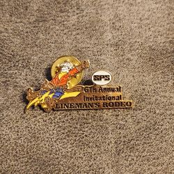 6th Annual Invitational Linemans Rodeo SPS Lapel Pin Metal Man Riding Bolt