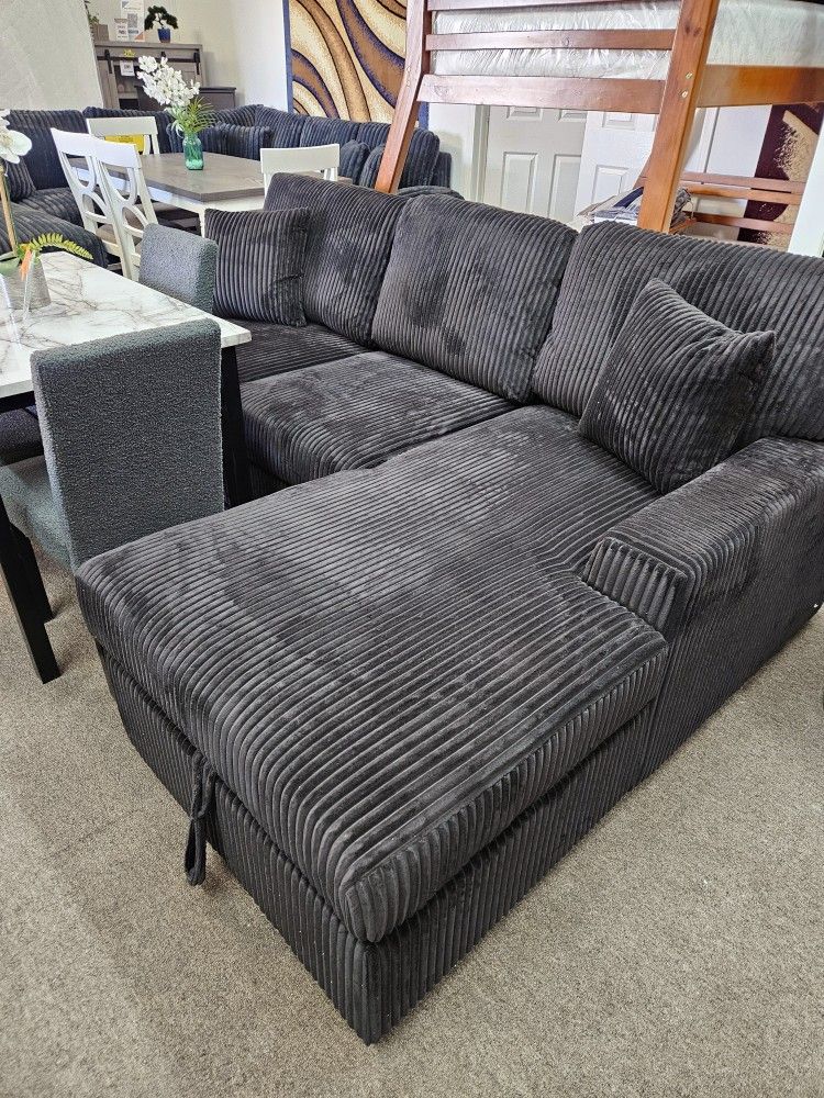New sectional with pullobed and storage $899