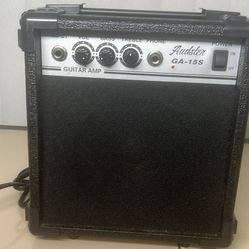Archer GA-15 electric guitar amplifier, a 15-watt practice amp with a 6.5-inch speaker, headphone jack. Used in good condition with some cosmetic blem