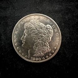 1880 CC Morgan Silver Dollar. Nice High Grade Coin. Looks Almost Uncirculated.
