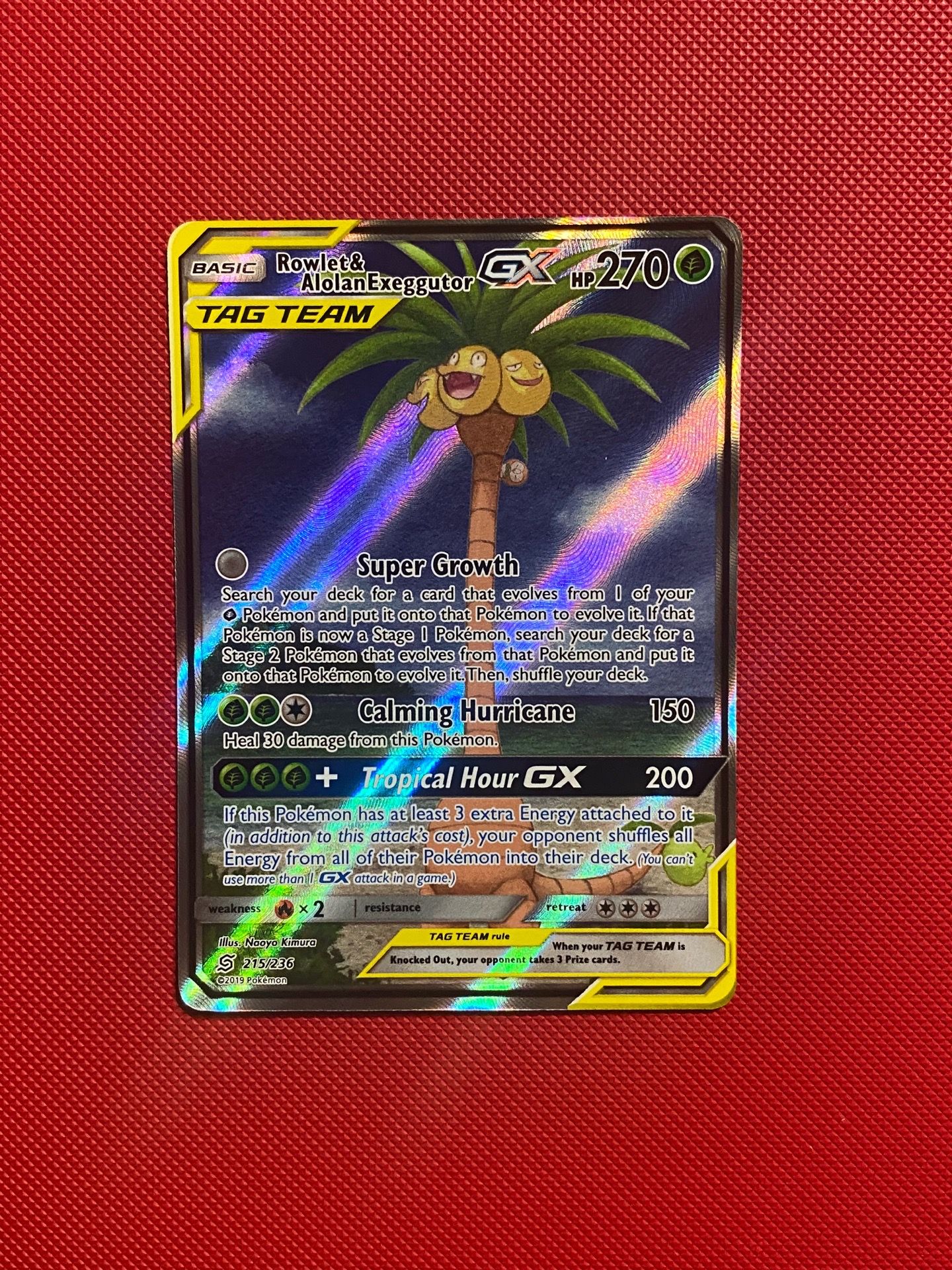 Pokemon Card TCG Rowlet and alolan exeggutor tag team gx