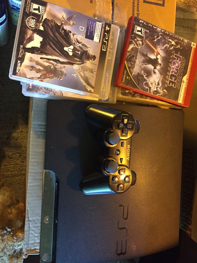 PS3 with controller and games