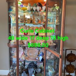 Curio Cabinet LargeWe are located at 2811 East Bell road. Another Time Around Furniture.
