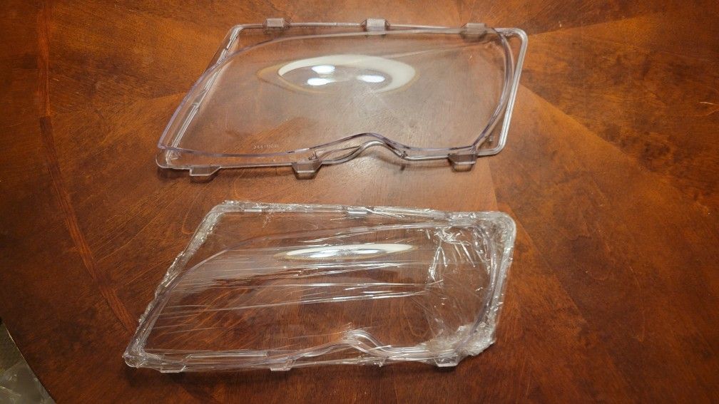 Two Driver side Headlight Lenses New