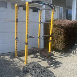 Squat rack,bench,barbell and weights