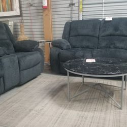 Top of the line Ashley dual reclining sofa and loveseat