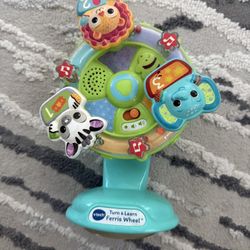 VTech VTech-80-165967 Musical Ferris Wheel Learn with Animals, Baby Highchair Toy +6 Months, ESP Version, Color, Single (367), 1 Ferris Wheel.