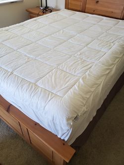 queen bed frame and mattress never used  in guest bedroom