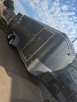 Enclosed trailer storage moving