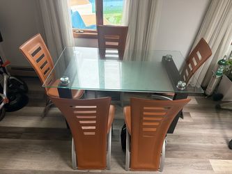 Heavy glass table with 4 chairs