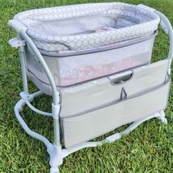 Ingenuity Baby Bedside Bassinet Cradle with Storage Height Adjustable