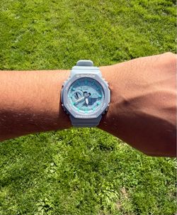 G-Shock Watch GA-2100-1A1.Grey and light blue dial, with an all grey resin strap