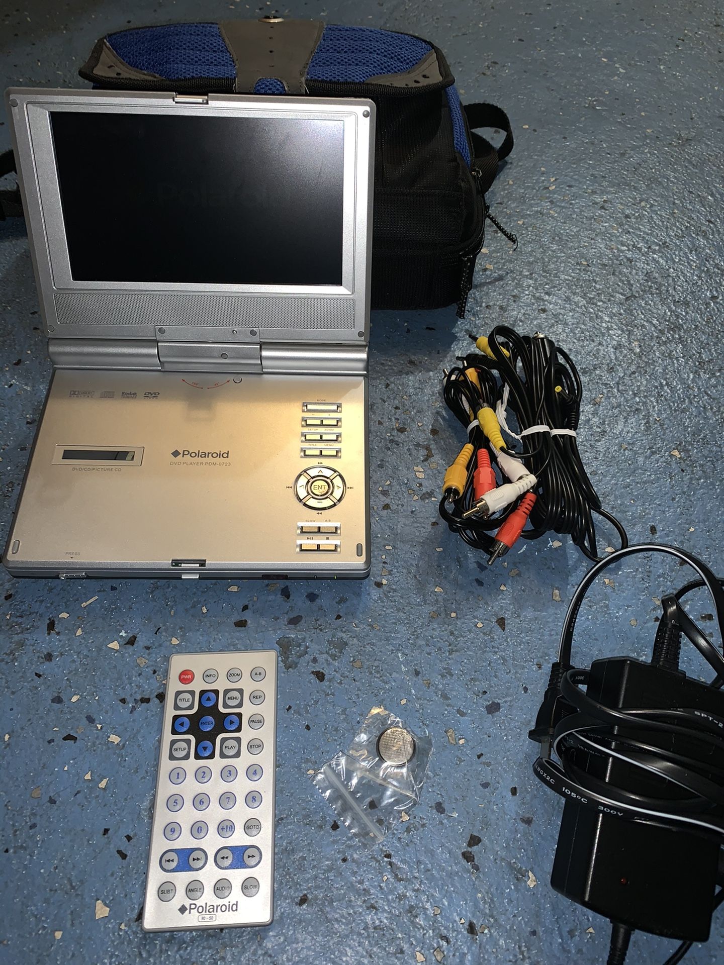 POLAROID 7" PORTABLE DVD PLAYER PDV0700 WITH EXTRAS for Sale in