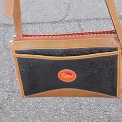 DOONEY AND BOURKE ALL-WHEATHER LEATHER BAG