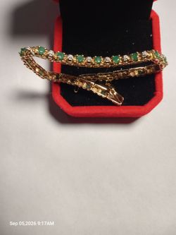Stunning 10K Yellow Gold Genuine Emerald Tennis Bracelet (7 Inches)