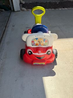 Fisher-Price Laugh & Learn Smart Car Ride-On