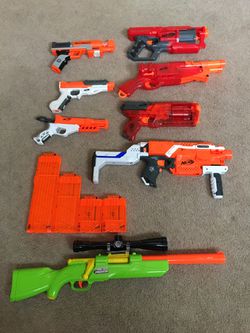 Nerf gun rifles and pistols with attachments