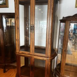 Bow Sided Glass Curio Cabinet