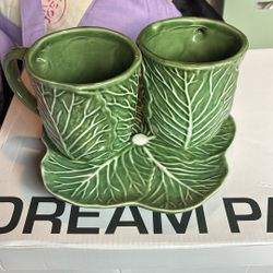 Two cabbage mugs and one plate