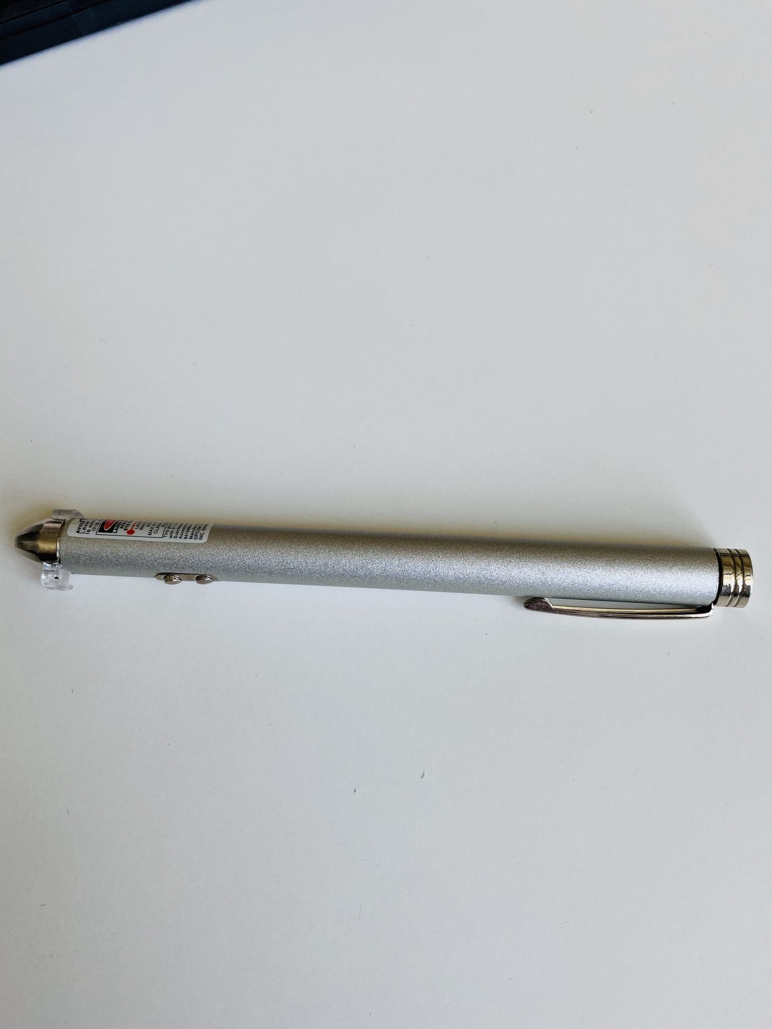 Laser Pointer with Dot, Underline & Strobe Functions. Durable metal construction. Matte Silver Finish. Nice storage case. New. Still in original packa