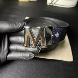 Black belt with silver pendant