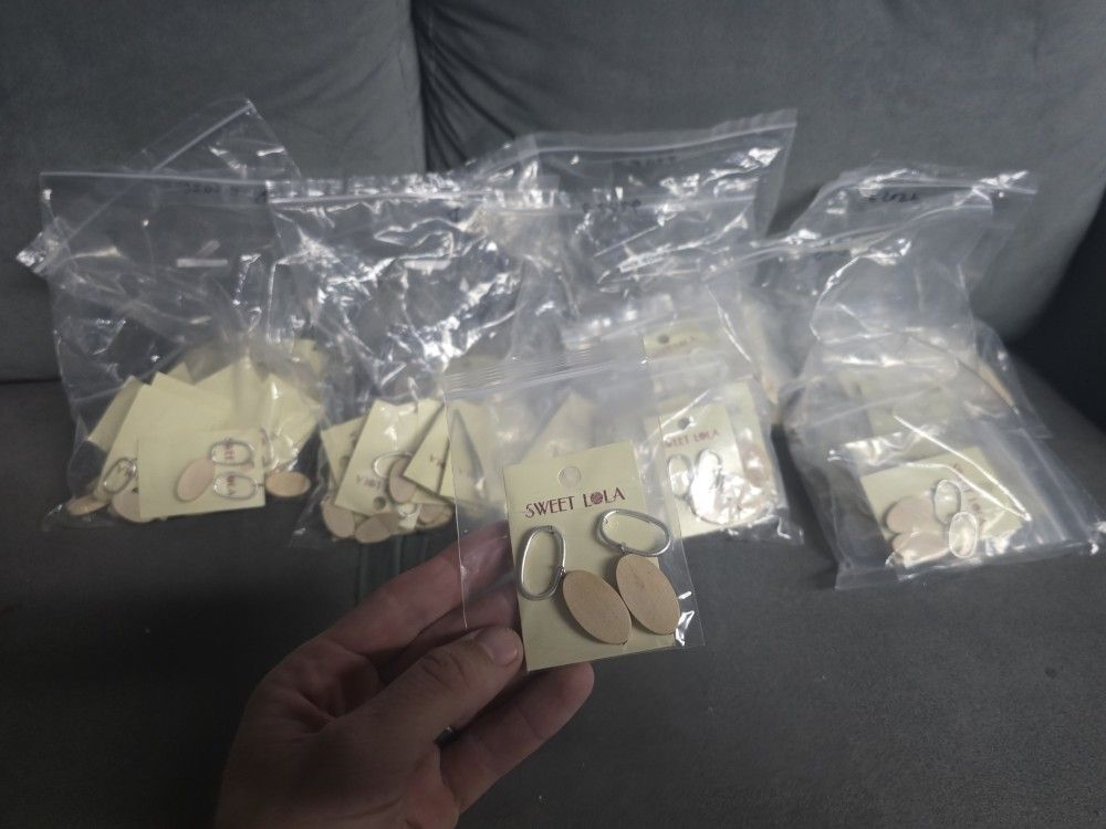 96 Pairs of earrings good for a store, event, sale etc all new!