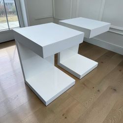 $200 for both! Two Modern White Glossy Rolling Designer C-Shape Night Stand End Tables. Excellent condition! 16.25x16.25x23.5in
