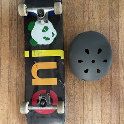 Enjoi Skateboard And Helmet