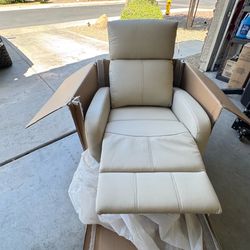 Maryvale Beige Leather Manual Swivel Glider Recliner