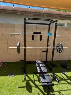 Squat rack with barbell + safety squat bar + 300lbs of plates